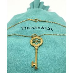 Tiffany & Co 18k Yellow Gold Diamond Key Pendant With Necklace. Condition: Good Pre-Owned - Pendant Might Show Light Signs Of Use But Overall In Great Condition. Stamped & Tested: Tiffany 18k Pendant Measures (Approx): Height (Including Bail): 45mm Width: 14mm. Key Is 41mm Long Without Bail Chain Is 18.5” Long Total Weight: 5.9 Grams. Comes With Tiffany Pouch And Box Jewelry Tiffany, Tiffany Co Jewelry, Key Pendant, Lighted Signs, Tiffany & Co., Gold Diamond, Yellow Gold, Pouch, Women Jewelry