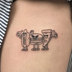 a tattoo on the back of a woman's stomach shows an image of two cartoon characters