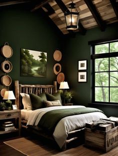 a bedroom with dark green walls and wooden floors, along with a large bed in the center