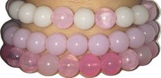 Elegant Pink Stackable Stretch Bracelet, Elegant Pink Stackable Bracelets, Pink Beaded Stretch Bracelet, Pink Stretch Bracelet With Colorful Beads, Pink Round 8mm Bead Jewelry, Pink Round Beaded Jewelry 8mm, Pink Rose Quartz Round Beaded Bracelets, Pink Hand-strung Crystal Bracelet, Pink Beaded Jewelry With 8mm Round Beads