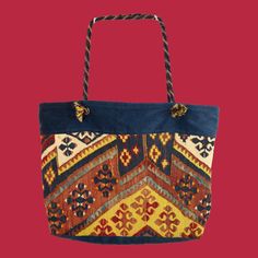 Our unique carpet bags are special additions to both women's and men's wardrobes. Made from recycled rugs, kilims, and velvets, with silk satin linings, they are not only extravagant but also durable companions for everyday use. Their sturdy design and wide shoulder strap provide comfortable wear, making them an ideal choice for a stroll either in the market or around the city. The pockets comfortably accommodate your daily necessities, and the zippered closure ensures the safety of your personal items. This bag is not just a fashionable accessory, but also an environmentally conscious choice. Our principle is that a handmade rug, regardless of its antique condition, is a treasure. Since 2006, we have been recycling various old Eastern textiles, with increasing success each year. Initially Unique Carpet, Carpet Bags, Recycled Rugs, Travel Handbag, Carpet Bag, Travel Handbags, Daily Necessities, Environmentally Conscious, Antique Rug