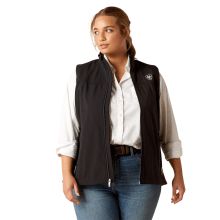 It's great for chores in cold weather, or the Ariat� New Team Softshell Vest for Ladies is simply a great-looking style that delivers the weatherproof warmth you're looking for. Its smooth twill softshell with microfleece backing is wind-resistant, water-resistant, and comfortably breathable. The Ariat New Team women's vest features updated, color block details and a standing collar. Zip pockets secure essentials. Made of 92% polyester/8% spandex. Imported. Manufacturer style #: 10020762.    Mad Ariat Vest Woman Outfit, Ariat Outfit Women, Ariat Outfit, Ariat Vest, Mucking Stalls, Weather Wind, Team Branding, Outdoor Vest, Western Store