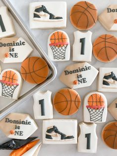 decorated cookies with basketballs and numbers on them