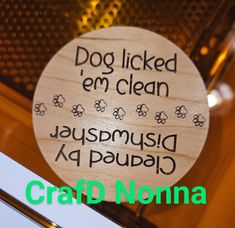 a wooden sign that says dog licked i'm clean