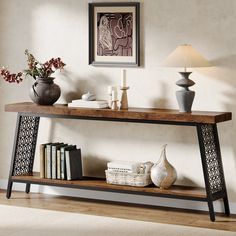 a wooden shelf with books and vases on top of it in a living room