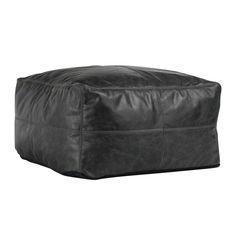 a large black leather ottoman on a white background