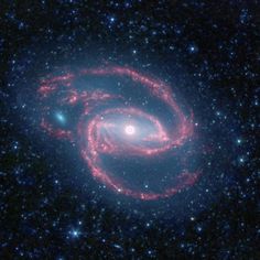 an image of a spiral shaped object in the middle of space with stars around it