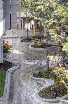 a water fountain in the middle of a courtyard