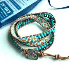 This Beautiful Triple Wrap Is Handcrafted With A Variety Of Small Gemstones, Glass Seed Beads And Genuine Leather. This Limited Edition Style Is A Lightweight And Smaller Version Of Our Traditional Classic Wrap That Offers A More Subtle And Delicate Look. About: 4mm & 6mm Turquoise Stones 2mm Glass Seed Beads 4mm Silver Tone Crystals Natural Genuine Leather 21”-25” In Length With 3 Sizing Options For S/M/L (One Size Fits All) Decorative Metal Button Closure Adjustable Blue Beaded Bracelets In Hippie Style, Adjustable Blue Beaded Bracelets, Hippie Style, Adjustable Blue Beaded Hippie Bracelets, Adjustable Blue Beaded Bracelets Hippie Style, Handmade Blue Wrap Bracelet For Festival, Bohemian Blue Wrap Bracelet With Colorful Beads, Blue Bohemian Wrap Bracelet With Colorful Beads, Blue Bohemian Wrap Bracelet For Festivals, Blue Wrap Bracelet With Colorful Beads For Festivals