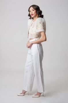 When looking to take your wardrobe to the next level, the Mayumi Bolero is an essential fashion staple. Featuring beautiful Sampaguita flower embroidery, a tribute to the Philippine national flower, the bolero exemplifies virtue, humility, and strength. Whether paired with a little black dress or worn over a simple white tee and jeans, the bolero provides a timeless yet modern touch to any ensemble. Let the Mayumi Bolero be the statement piece of your look. Features Crafted from the finest Jusi Filipiñana Modern, Casual Filipiniana Outfit, Filipiñana Dress Modern Casual, Simple Filipiniana Dress, Filipiniana Bolero Outfit, White Filipiniana Dress, Modern Filipiniana Dress Kultura, Modern Filipiniana Outfit Classy Pants, Filipiniana Dress Modern Simple