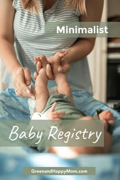 a woman is holding her baby's feet in the air with text overlay that reads, minimalist baby registry