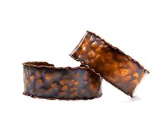 "Adorable hand forged copper cuff bracelet. Beautiful rustic look and character. Measures approximately 1\" at widest point. Inside diameter can be adjusted by simply flexing the cuff. NOTE: Listing is for ONE cuff NOTE: The beauty of all ethnic jewelry comes from its distinct rustic feel. There are unique variations in color and texture due to the handmade process." Artisan Copper Cuff Bangle Bracelet, Artisan Copper Bangle Cuff Bracelet, Handmade Brown Copper Bangle, Handmade Copper Bangle In Brown, Bronze Bangle Bracelet In Wearable Art Style, Hand Forged Bronze Copper Cuff Bracelet, Wearable Art Copper Bangle Bracelets, Artisan Bronze Copper Cuff Bracelet, Copper Bangle Bracelets In Wearable Art Style