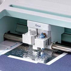 an image of a machine that is cutting paper