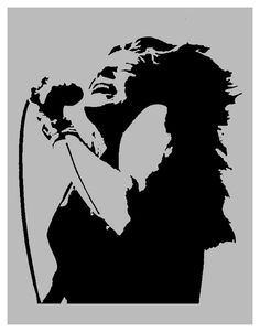 a black and white image of a woman singing into a microphone with the words joann stencil spray paint stencils com