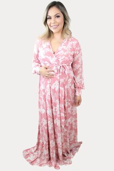 This is the perfect pink floral maternity maxi. Features a gorgeous pink color with a standout white floral print. The sweetheart neckline is perfect for nursing, long loose sleeves, and a tie waistline to keep you comfy! An ideal floral baby shower maxi, date night dress, or just because. Designed for wear throughout all nine months of pregnancy and beyond! Date Night Dress, Pregnancy Months, Maternity Maxi, Loose Sleeves, Nine Months, Perfect Pink, Floral Baby Shower, Date Night Dresses, Floral Baby