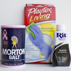 various cleaning products are displayed on a white surface, including detergents and gloves