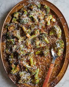 broccoli covered in parmesan cheese and sprinkled with parmesan