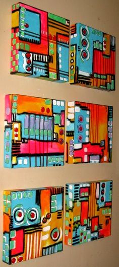 three colorful paintings are hanging on the wall