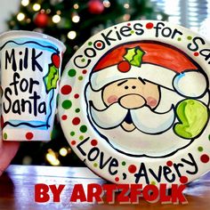 a plate and cup are decorated with santa's face on it, along with the words cookies for santa love avery by artfok