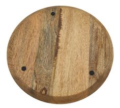 a wooden cutting board with black dots on the edges and wood grains in it