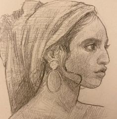 a pencil drawing of a woman's head with ear rings on her left side