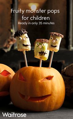 two pumpkins with faces on them sitting next to each other and the words fruity monster pops for children ready in only 35 minutes