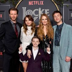 the cast of hockie poses for a photo on the red carpet at the premiere