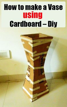 a cardboard box sitting on the floor with words overlaying it that says how to make a vase using cardboard - diy