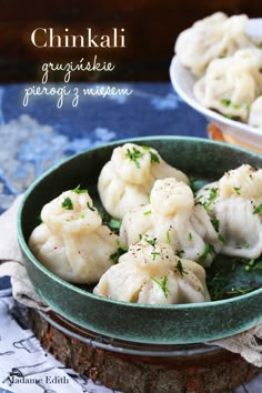 some dumplings are in a bowl on a table