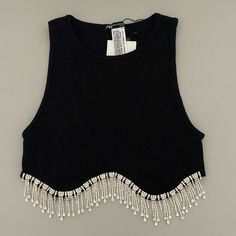 Zara Black Limitless Contour Collection Rhinestone Crop Top. Never Used, Sleeveless, Size Xs-S, And Is In Perfect Condition! 93% Polyamide 7% Elastane Questions Are Welcome! Chic Embellished Sleeveless Crop Top, Chic Fitted Top With Rhinestone Fringe, Chic Fitted Tops With Rhinestone Fringe, Elegant Embellished Black Crop Top, Elegant Black Embellished Crop Top, Trendy Black Tops With Rhinestone Fringe, Black Fitted Crop Top With Rhinestones, Chic Black Crop Top With Rhinestones, Summer Stretch Crop Top With Rhinestones