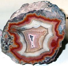 a piece of art that looks like it is made out of agate and silver