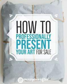 a present wrapped in gray paper with the words how to professionally present your art for sale