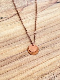 "Item Overview *Handmade item *Hand Hammered Copper Disc Pendant on Copper Chain *Ships anywhere in the US from Bellingham, Washington Item Details This delicate minimalist necklace is a copper hand hammered disc layered with a smaller disc on top.  This necklace will go with all your outfits - dress it up or wear it with jeans and a t-shirt.  Either way you'll look fabulous. On a Copper chain.  Necklace is 19\" long with a lobster clasp as shown. Very light weight and versatile To view more of my unique, handcrafted Jewelry designs  please visit: https://www.etsy.com/shop/IsleInspiredBoutique Thanks for visiting my shop..! Should you need any further information, please do not hesitate to contact me." Copper Chain Necklace, Bellingham Washington, Outfits Dress, Disc Pendant, Copper Pendant, Copper Necklace, Hammered Copper, Copper Chain, Copper Pendants