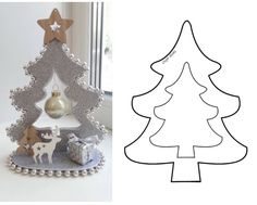 an image of a christmas tree with ornaments on it and a cut out of the shape