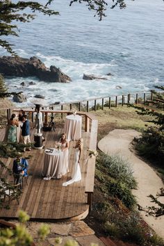 the bride and groom are getting ready to walk down the aisle at their wedding ceremony