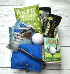 a golf gift basket with various items on it