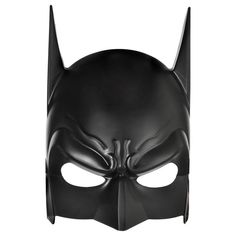 the dark knight batman mask is shown on a white background and it's black