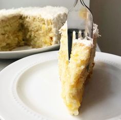 a piece of cake on a white plate with a fork in it and the rest of the cake has been eaten