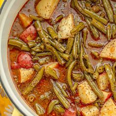 potatoes and green beans are in a pot