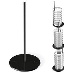 there are three glass cups and two metal poles on the same stand, one is black