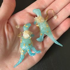 Baby Blue Dinosaur Drop Earrings With Gold Detail. I Got These From The Boujiesaurus Boutique At A Farmers Market In Brooklyn A Few Months Ago On A Whim Because They Were So Cute, But I’ve Been Having A Lot Of Earrings Problems Recently So Don’t Want To Risk! I’ve Never Worn These / Even Tried Them. They’re Beautiful And So Cute And I Want Them To Be Used!! Transmasc Style, Louis Vuitton Earrings, Blue Sapphire Studs, Blue Dinosaur, Dinosaur Earrings, Silly Guy, Dainty Studs, Jade Earrings, Statement Drop Earrings