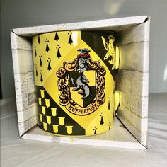 a harry potter coffee mug in a box