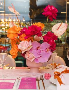 a vase filled with flowers on top of a table