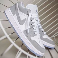 Unlock your potential and take to the streets with the Grey Low Custom Air Jordan 1. Crafted with sleek gray tones, let these sneakers be the tools to your ambition. Step into challenge and take a risk like never before! 🔥 🔥 100% genuine, Brand New.👟 Custom sneakers.💫 Every pair is hand-made to order.✨ Best quality waterproof and scratch-proof paints used.✨ 1000+ satisfied customers across various platforms. 🌎Free worldwide shipping,shipping within 5-12 working days🎁 Treat the shoes as art Aj1 Low, Jordan 1 Low White, Cheap Jordan Shoes, Nike Shoes Girls, Basket Style, Nike Fashion Shoes, Pretty Shoes Sneakers