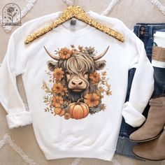 Fall Sweatshirt Highland Cow Shirt Cow Shirt Fall Pumpkin Shirt Cow Sweatshirts Fall Sweater Floral Cow Crewneck Farmer Shirt Cowgirl Shirts Fall Sweatshirt, Highland Cow, Crewneck Sweatshirt, Fall Shirts, Fall Shirt, Fall Sweaters, Floral Shirt, Plant Shirt, Country Western, Cow Shirts, Cow Lover Gift, Cow Gifts, Cow Sweatshirt, Cow Tshirt  ALL OF OUR ITEMS CAN BE MADE IN YOUTH SIZES, TSHIRTS (COMFORT COLORS AND BELLA CANVAS), SWEATSHIRTS AND HOODIES AND IN OTHER COLORS THAN LISTED USUALLY. IF Cute White Fall Shirt, Cute White Shirt For Fall, Cow Sweatshirts, Cow Crewneck, Cow Shirts, Farmer Shirt, Cow Tshirt, Cow Gifts, Cow Shirt