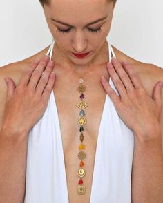 The chakra yoga jewelry for women charm necklace was designed for you to gaze at during your yoga practice, or wear to represent your yoga practice. The intent of this yoga necklace is to be mindful and bring awareness to your chakra energy points. The yoga chakra charm pendants for jewelry making and adding a sense of harmony and balance to yourself and your environment. Gazing at the symbols and colors of this woman’s necklace jewelry will heighten your sense of confidence, inspiration, and id Cheap Spiritual Round Bead Jewelry, Luxury Unique Jewelry For Meditation, Chakra Jewelry Mystic Crystal Imports, Chakra Jewelry Stone, Affordable Spiritual Jewelry With Large Pendant, Luxury Spiritual Jewelry For Diwali, Cheap Spiritual Jewelry With Large Pendant, Cheap Spiritual Charm Necklaces, Symbolic Handmade Necklaces