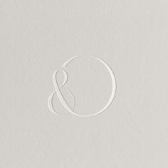 the letter b and c is made out of white paper with an oval shape on it