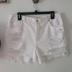 Free People We The Free Maggie Distressed White Denim Shorts Brand New With Tags Size 31 White Ripped Relaxed Fit Bottoms, White Distressed Mid-rise Bottoms, White Distressed High Waist Bottoms, White Ripped Denim Jean Shorts, White Distressed Denim Shorts, White Distressed Cutoff Bottoms, White Ripped High Waist Shorts, White Distressed Short Bottoms, White Ripped Cutoff Bottoms