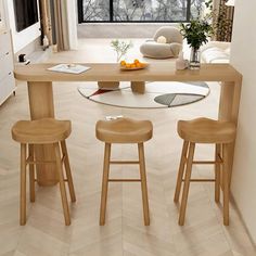 a kitchen table with three stools in front of it and an open window to the outside