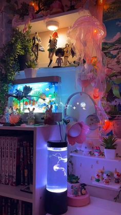 a room filled with lots of different types of toys and decorations on top of a shelf